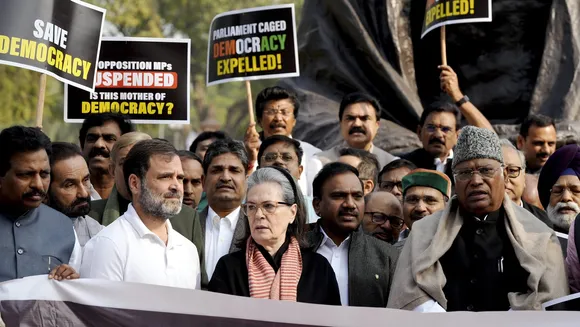 Congress President Mallikarjun Kharge with party leaders Sonia Gandhi and Rahul Gandhi and other opposition leaders during a protest over the suspension of MPs