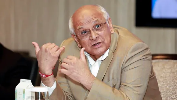 Gujarat Chief Minister Bhupendra Patel addresses a meeting with the delegates of the Singapore Business Federation ahead of the ‘Vibrant Gujarat Global Summit 2024’, in Singapore