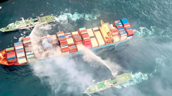 Smoke billows after a fire broke out on a merchant vessel off Goa coast. The Indian Coast Guard (ICG) carried out fire-fighting operations on the ship.