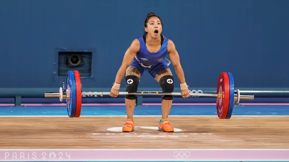 India's Mirabai Chanu after her unsuccessful third attempt during the clean and jerk stage of the women's 49kg weightlifting event at the 2024 Summer Olympics, in Paris, France, Wednesday, Aug. 7, 2024.