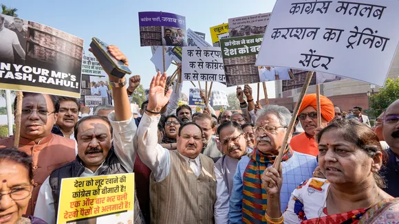BJP National President and MP J.P. Nadda with party MPs during a protest against Congress during the Winter session of Parliament