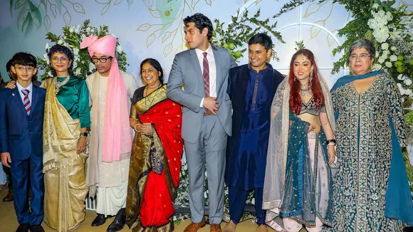 Fitness trainer Nupur Shikhare and Ira Khan with actor Aamir Khan and other family members during their wedding festivities, in Mumbai