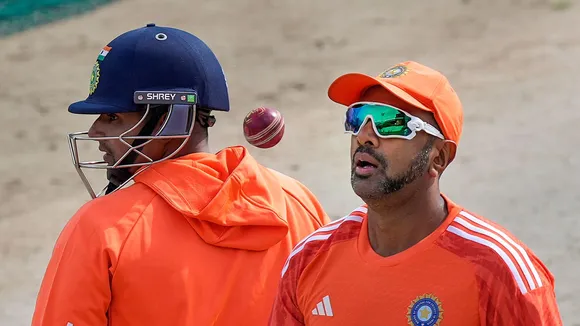 India's R Ashwin and Sarfaraz Khan during a practice session ahead of the fifth Test cricket match between India and England, at the HPCA Stadium in Dharamsala
