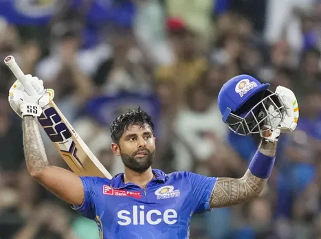 Mumbai Indians batter Suryakumar Yadav celebrates his century during the IPL 2023 cricket match between Gujarat Titans and Mumbai Indians