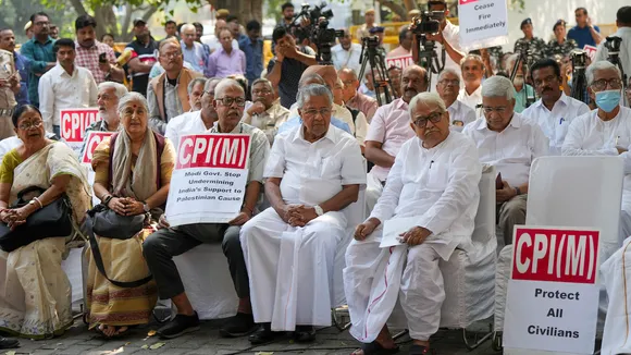 Kerala CM and CPI(M) leader Pinarayi Vijayan with party leaders Biman Bose and Prakash Karat during a demonstration over Israel-Palestine conflict at party office, in New Delhi, Sunday, Oct. 29, 2023.