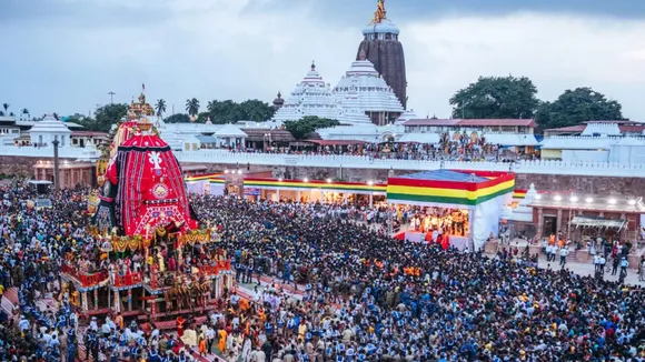 Devotees take part in the annual Rath Yatra, in Puri