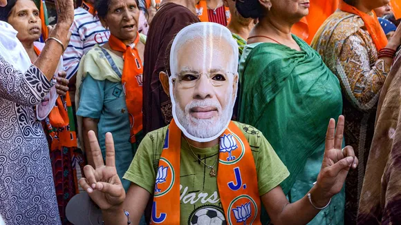 BJP supporters during a roadshow of party candidate Taranjit Singh Sandhu, in Amritsar, Monday, May 27, 2024