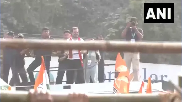 Rahul Gandhi watches as Congress workers break police barricades in Guwahati