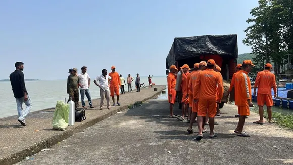 NDRF personnel preparing for a search operation in the lake