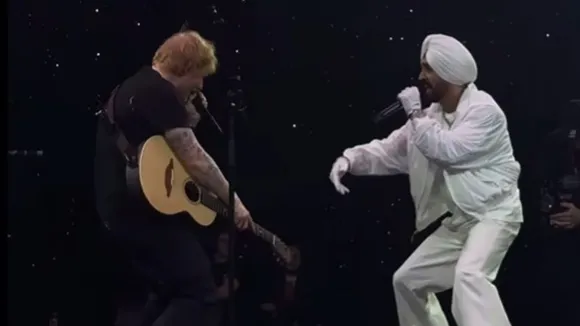Diljit Dosanjh and Ed Sheeran performing in Birmingham