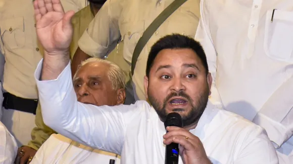 RJD leader Tejashwi Yadav during a press conference, in Patna, Friday, April 5, 2024