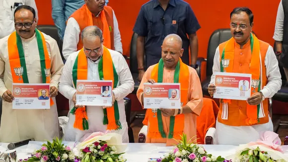 Uttar Pradesh Chief Minister Yogi Adityanath with Deputy Chief Ministers Brijesh Pathak and Keshav Prasad Maurya and state BJP President Bhupendra Singh Chaudhary during BJP's membership renewal drive, in Lucknow, Tuesday, Sept. 3, 2024.