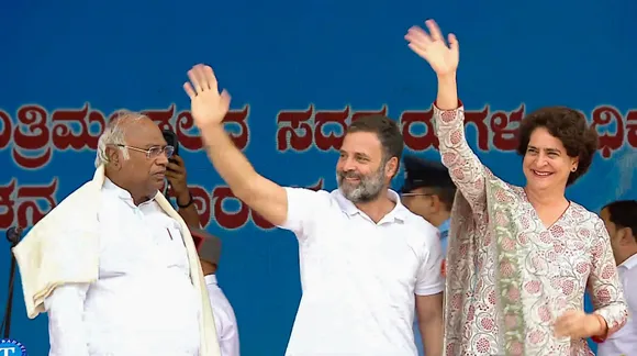 Congress President Mallikarjun Kharge with party leaders Rahul Gandhi and Priyanka Gandhi during the oath ceremony of Karnataka's CM and ministers, at Kanteerava Stadium in Bengaluru