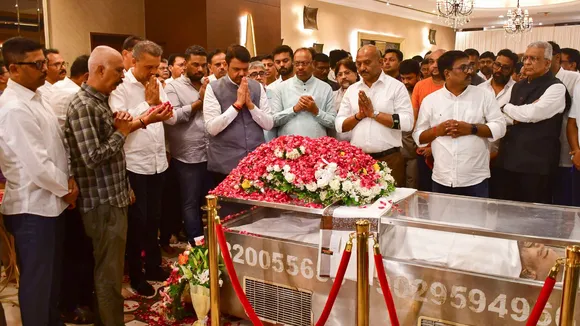 Maharashtra Deputy Chief Minister Devendra Fadnavis and State BJP President Chandrashekhar Bawankule pay their last respects to Mumbai Cricket Association president Amol Kale, who recently passed away due to cardiac arrest, in Mumbai, Wednesday, June 12, 2024.