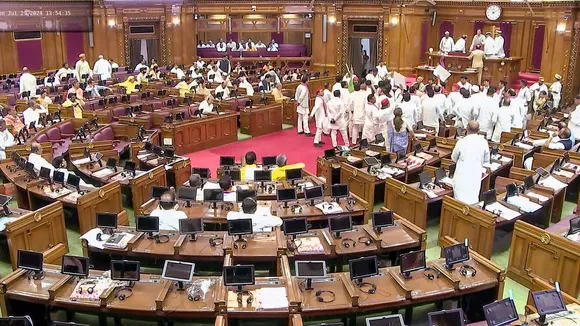 Opposition MLA protest in the well of the Uttar Pradesh Legislative Assembly during the Monsoon session, at Vidhan Bhavan, in Lucknow, Monday, July 29, 2024.