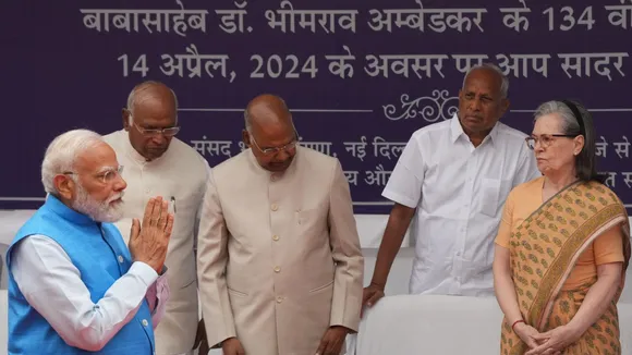 Prime Minister Narendra Modi greets former President Ram Nath Kovind, Congress President Mallikarjun Kharge and party leader Sonia Gandhi as he arrives for an Ambedkar Jayanti event, at Parliament, in New Delhi, Sunday, April 14, 2024