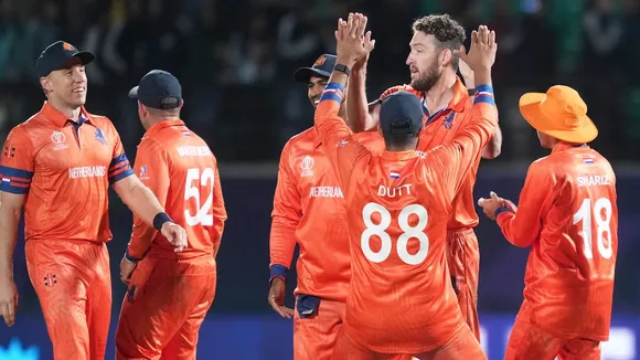 Netherlands' Paul van Meekeren celebrates with teammates after taking the wicket of South Africa's Marco Jansen during the ICC Men’s Cricket World Cup 2023 match between South Africa and Netherlands, at HPCA Stadium, in Dharamshala, Tuesday, Oct. 17, 2023.