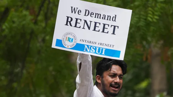 NSUI activists raise slogans during their Chhattra Sansad Gherav protest at Jantar Mantar against the alleged irregularities in NEET-UG and cancellation of UGC-NET exams, in New Delhi, Monday, June 24, 2024.