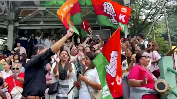 Sikkim Krantikari Morcha (SKM) members celebrate their lead in the Assembly polls, outside a counting centre, in Gangtok, Sunday, June 2, 2024