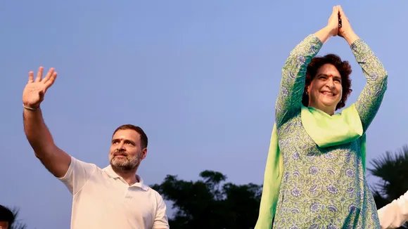 Congress leaders Rahul Gandhi and Priyanka Gandhi Vadra walk during Vijayabheri Yatra, in Mulugu district