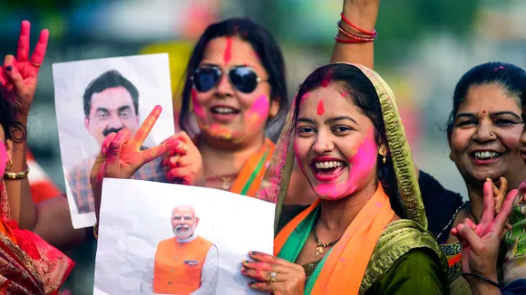 BJP workers and supporters celebrate party's lead in Madhya Pradesh, Rajasthan and Chhattisgarh during counting of votes for elections to the Legislative Assemblies of the states, in Jabalpur, Sunday, Dec. 3, 2023.