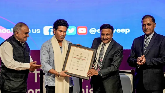 Chief Election Commissioner (ECI) Rajiv Kumar, and other commissioners Arun Goel and Anup Chandra Pandey with cricket legend Sachin Tendulkar during a programme in New Delhi