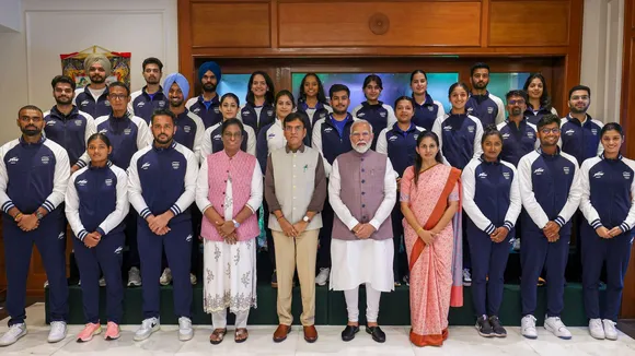Prime Minister Narendra Modi with Union Minister of Youth Affairs and Sports Mansukh Mandaviya and Indian Olympic Association President PT Usha poses for a group photo with the Indian contingent heading for the upcoming Paris Olympics.