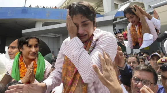 Wrestler Vinesh Phogat being welcomed on her arrival after Paris Olympics heartbreak, at IGI airport, in New Delhi, Saturday, Aug. 17, 2024