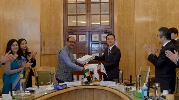 Vikas Sheel and Suzuki Hiroshi strike a happy pose after signing the deal