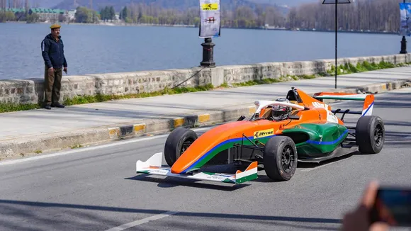 A participant at the Formula-4 Indian Racing Festival 2024 near the Dal Lake in Srinagar
