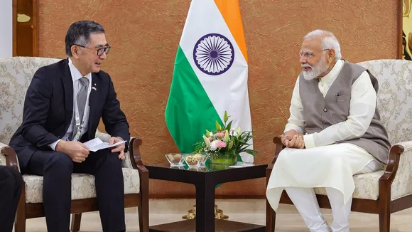 Prime Minister Narendra Modi in a meeting with Suzuki Motor Corp President Toshihiro Suzuki, in Gandhinagar