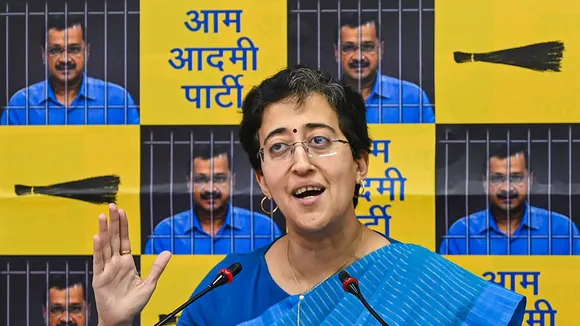 Delhi Minister and AAP leader Atishi Singh addresses a press conference, at the party office in New Delhi, Friday, April 5, 2024
