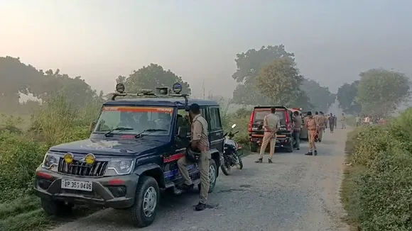 Police at the site of encounter after killing of Anuj Pratap Singh, who robbed Sultanpur's Bharti Jewelers, at Achalganj, Unnao, Monday, Sept. 23, 2024.
