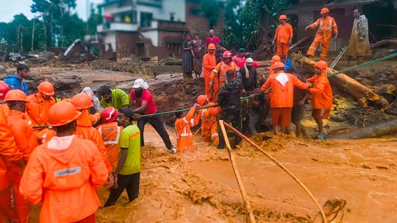 National Disaster Response Force (NDRF) personnel conduct rescue operation after huge landslides in the hilly areas near Meppadi, in Wayanad district, Kerala, Tuesday, July 30, 2024.