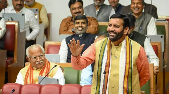 Haryana Chief Minister Nayab Singh Saini speaks as former CM Manohar Lal Khattar looks on during a special session of the state Assembly, in Chandigarh