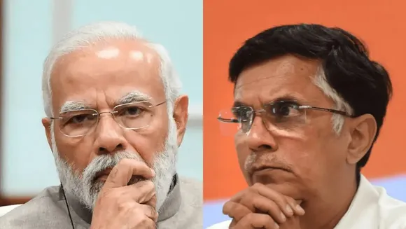Narendra Modi Pawan Khera.jpg