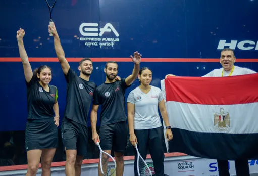 Egypt's squash players pose after winning the World Squash Federation (WSF) World Cup 2023 against Malaysia, in Chennai