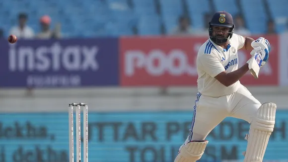 Indian batter Rohit Sharma plays a shot on the first day of the third cricket test match between India and England, at Niranjan Shah Stadium, in Rajkot