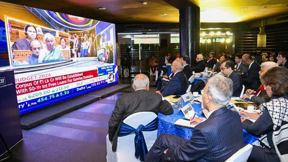 Business leaders watch the live telecast of the presentation of the Interim Budget 2024 by Union Finance Minister Nirmala Sitharaman, at the Confederation of Indian Industry (CII) headquarters, in New Delhi,