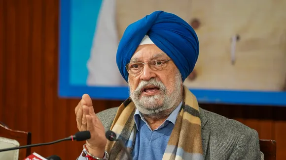 Union Minister Hardeep Singh Puri addresses a press conference at his residence, in New Delhi