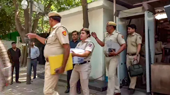 Delhi Police personnel at the residence of Delhi CM Arvind Kejriwal to investigate in connection with AAP MP Swati Maliwal's assault case, in New Delhi, Sunday, May 19, 2024