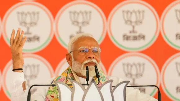Prime Minister Narendra Modi addresses a public meeting at Bardhaman, ahead of the third phase of Lok Sabha elections, in Purba Bardhaman district