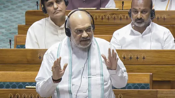 Union Home Minister Amit Shah speaks in the Lok Sabha during the Monsoon session of Parliament, in New Delhi, Tuesday, Aug. 6, 2024.