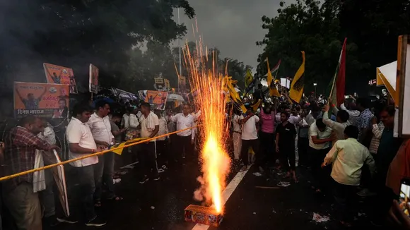 Supporters celebrate Delhi Chief Minister Arvind Kejriwal's release from the Tihar Jail on bail granted by the Supreme Court in a case registered by the CBI in the excise policy case, in New Delhi, Friday, Sept. 13, 2024