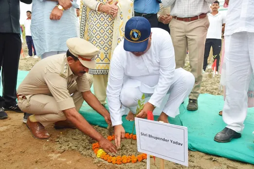 Bhupendra yadav planting mangrove trees.jpg