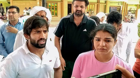 Wrestlers Bajrang Punia and Sakshi Malik. 