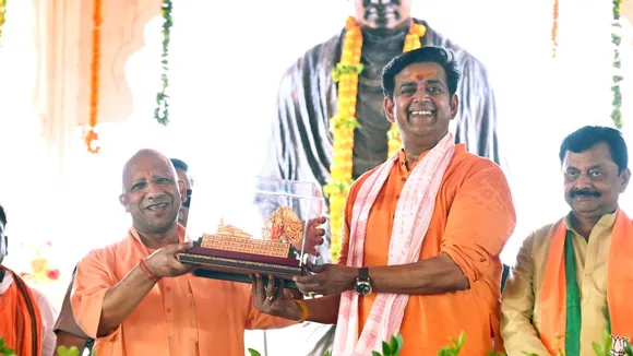 Uttar Pradesh Chief Minister Yogi Adityanath and BJP candidate from Gorakhpur constituency Ravi Kishan during a public meeting for Lok Sabha elections, in Gorakhpur, Friday, May 10, 2024