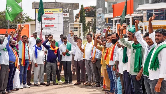 Pro-Kannada activists raise slogans during a protest against Cauvery Water Management Authority (CWMA) over its decision to ensure a flow of 5,000 cusecs of river water to Tamil Nadu till Sept. 29