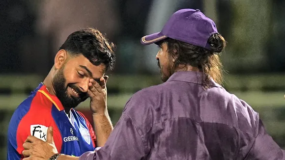 Actor and Kolkata Knight Riders (KKR) co-owner Shah Rukh Khan greets Delhi Capitals' captain Rishabh Pant after KKR won the Indian Premier League (IPL) T20 cricket match