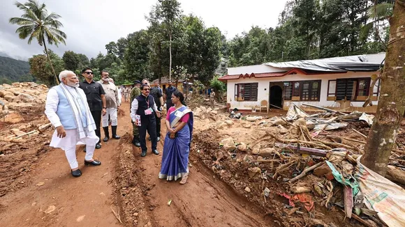 Prime Minister Narendra Modi interacts with officials during inspection of the landslide-affected areas, in Wayanad district, Saturday, Aug. 10, 2024. MoS Suresh Gopi is also seen.